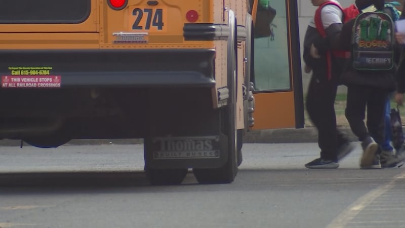 Caleb Hendrick says he witnessed his two young children nearly get hit by a car at their bus...