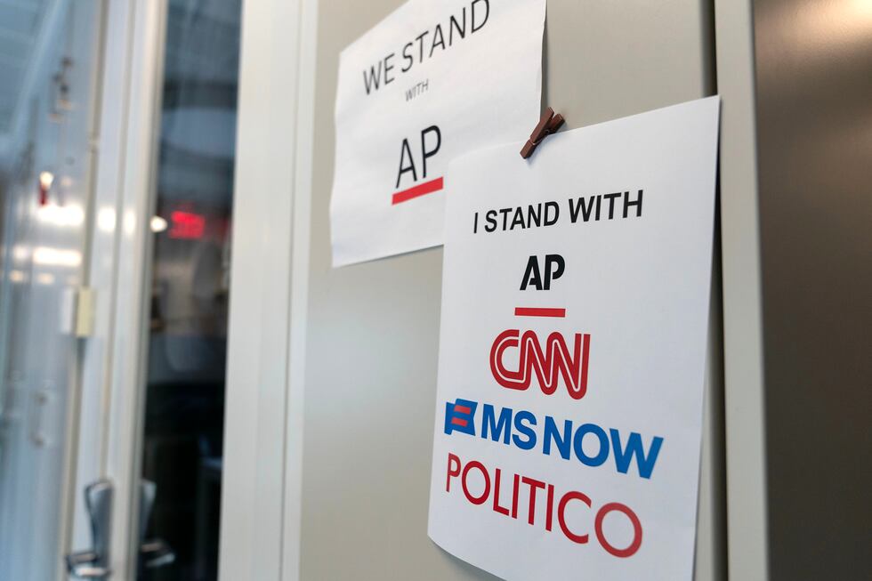 A sign in support of news outlets is seen at the White House press room, Sept. 19, 2026, in...