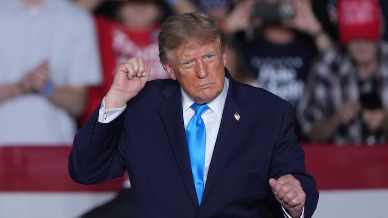 President Donald Trump dances at a campaign rally at the Pinnacle Bank Expo Center, Monday,...